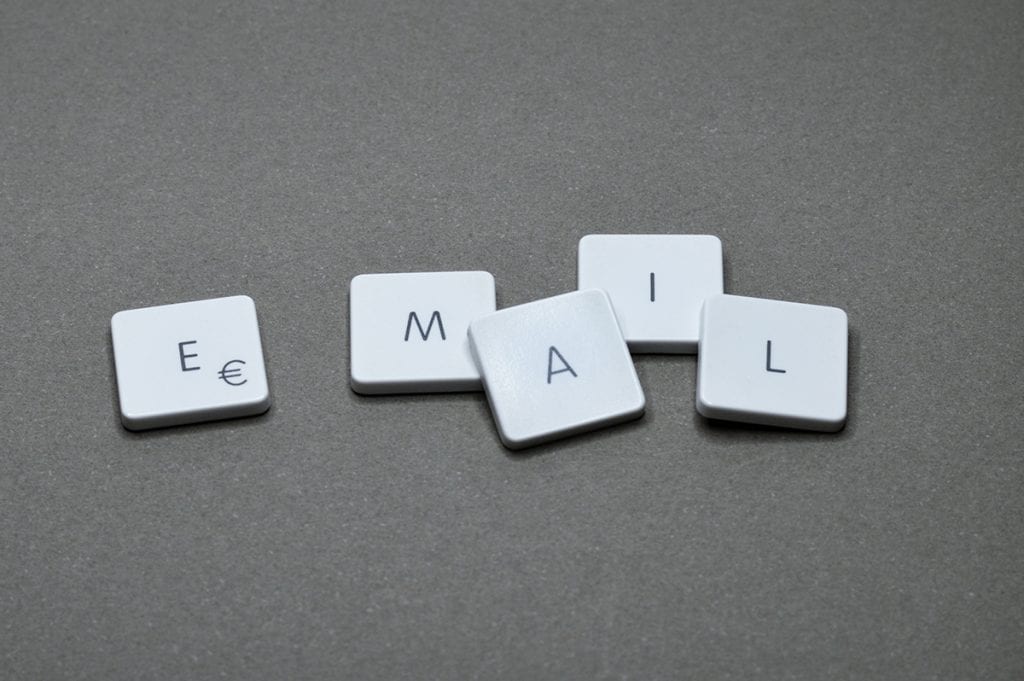 Tiles that spell out the word, "email" as to start the phrase "email follow-up sequence"